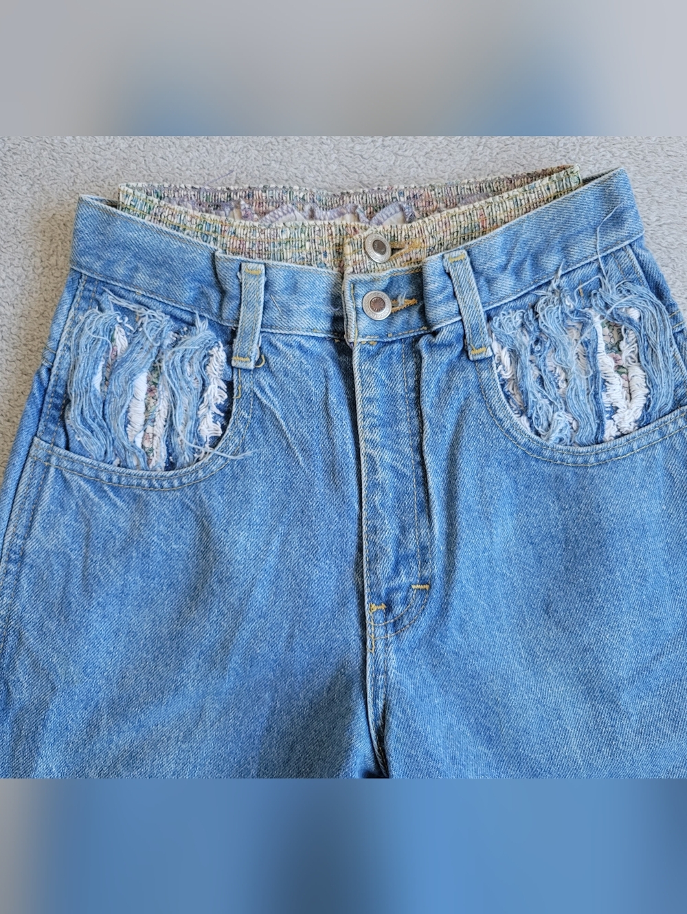 High-Waist Light Blue Distressed Women’s Jeans with Showing Underware